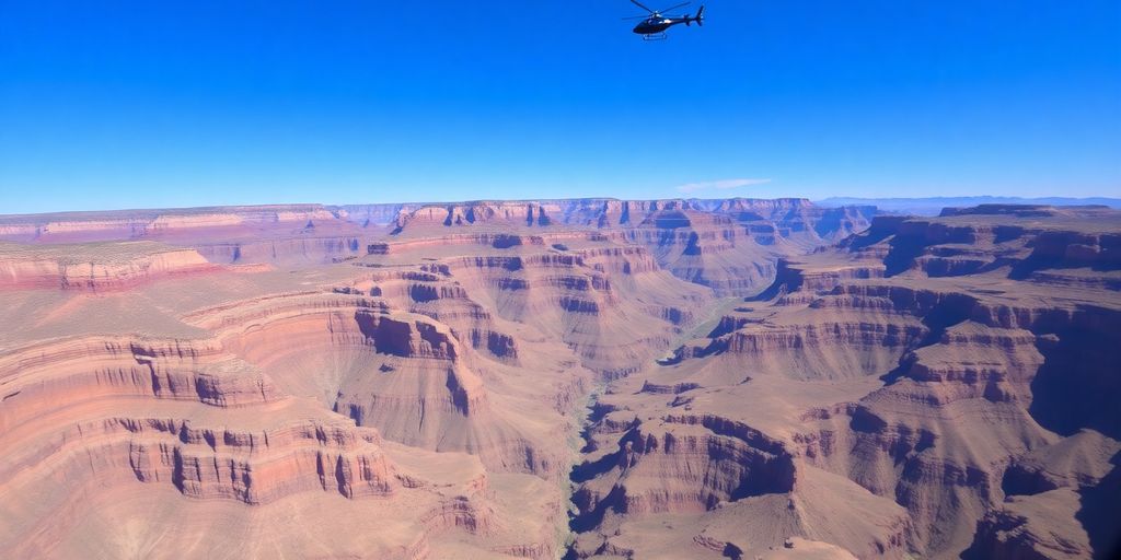 Helicopter flying over the stunning Grand Canyon landscape.