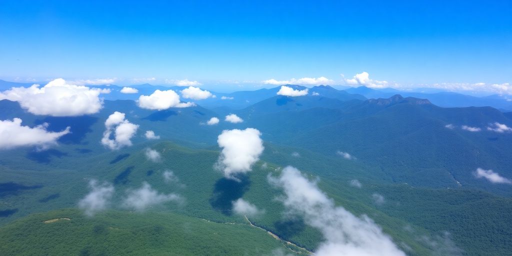 Helicopter flying over the Smoky Mountains landscape.