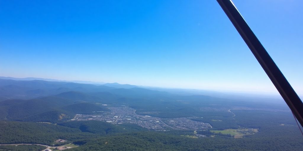 A helicopter soars over the Blue Ridge Mountains near Asheville.