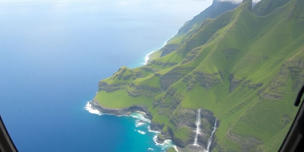 An open-door helicopter flying over Kauai's dramatic green coastline.